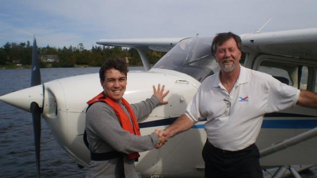 Stephen Keays being congratulated by CFI John Porter after his Float Plane rating